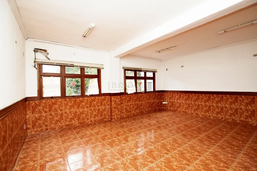 Foto 1 de Casa com 3 Quartos à venda, 258m² em Rio Branco, Porto Alegre