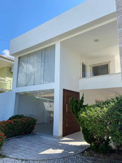 Foto 1 de Casa de Condomínio com 5 Quartos para venda ou aluguel, 440m² em Centro, Lauro de Freitas
