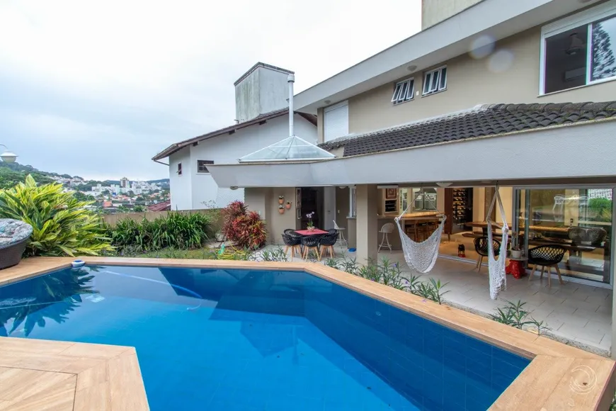 Foto 1 de Casa de Condomínio com 3 Quartos à venda, 355m² em Itacorubi, Florianópolis