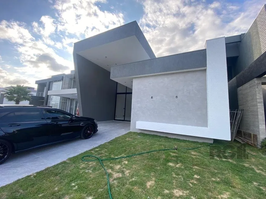 Foto 1 de Casa de Condomínio com 4 Quartos à venda, 146m² em Centro, Xangri-lá