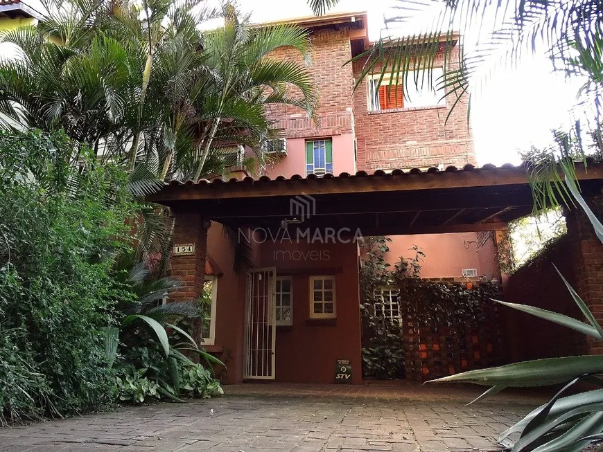 Foto 1 de Casa com 4 Quartos à venda, 330m² em Espiríto Santo, Porto Alegre