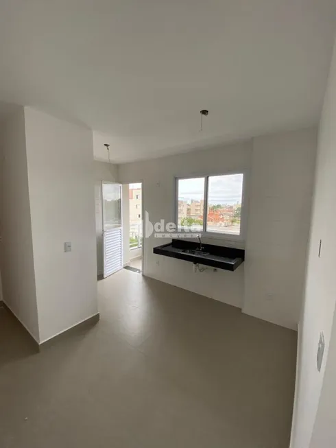 Foto 1 de Apartamento com 2 Quartos à venda, 62m² em Santa Mônica, Uberlândia