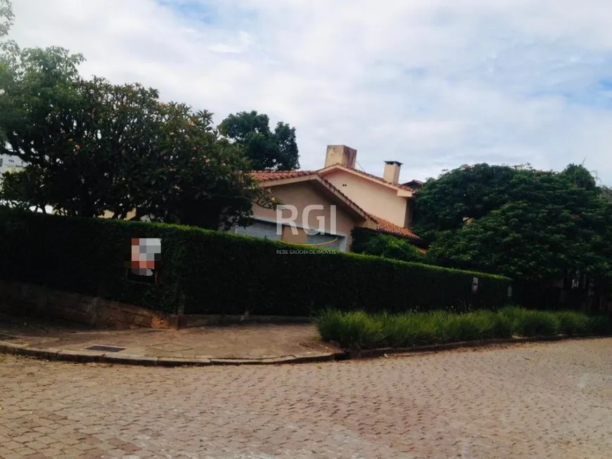 Foto 1 de Casa com 8 Quartos à venda, 499m² em Jardim Lindóia, Porto Alegre
