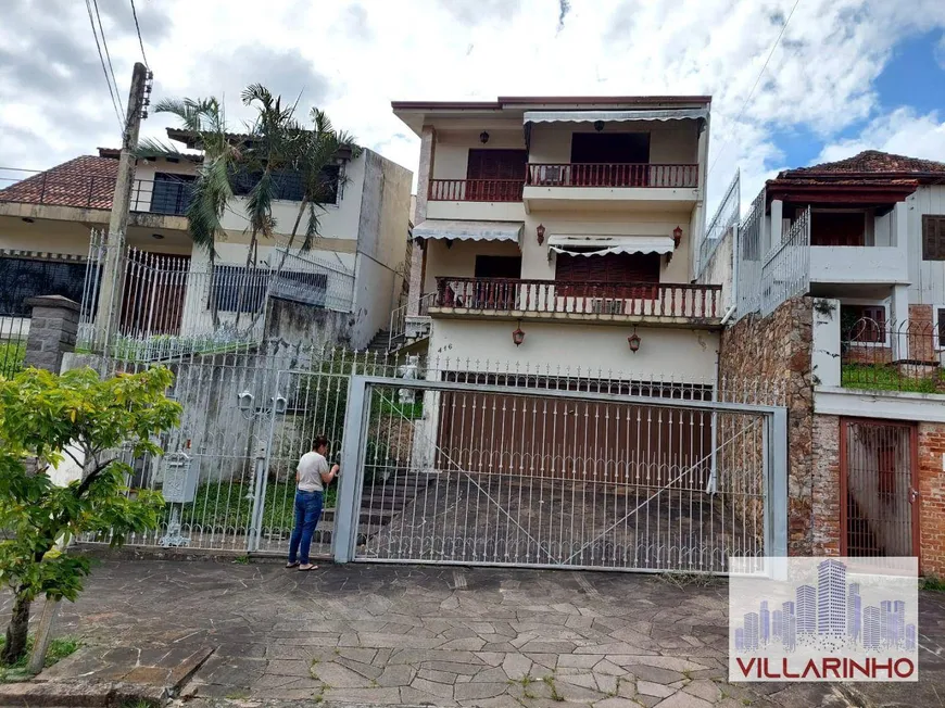 Foto 1 de Casa com 5 Quartos à venda, 592m² em Santo Antônio, Porto Alegre