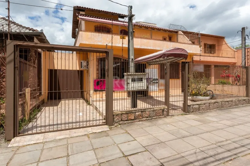 Foto 1 de Casa com 5 Quartos à venda, 332m² em Partenon, Porto Alegre