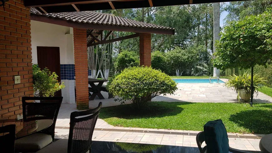 Foto 1 de Casa de Condomínio com 4 Quartos para venda ou aluguel, 459m² em Granja Viana, Carapicuíba