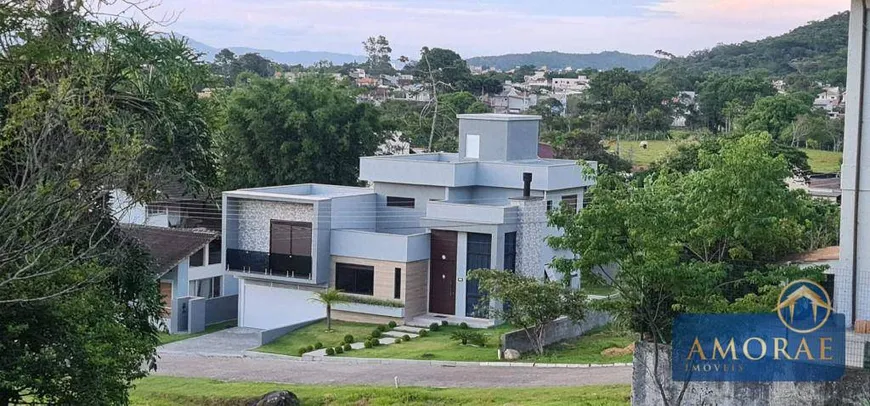 Foto 1 de Casa de Condomínio com 4 Quartos à venda, 235m² em Cachoeira do Bom Jesus, Florianópolis