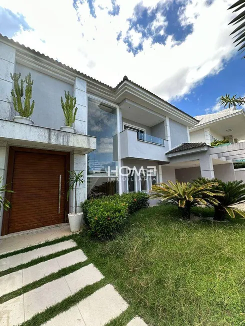 Foto 1 de Casa de Condomínio com 4 Quartos para venda ou aluguel, 560m² em Barra da Tijuca, Rio de Janeiro