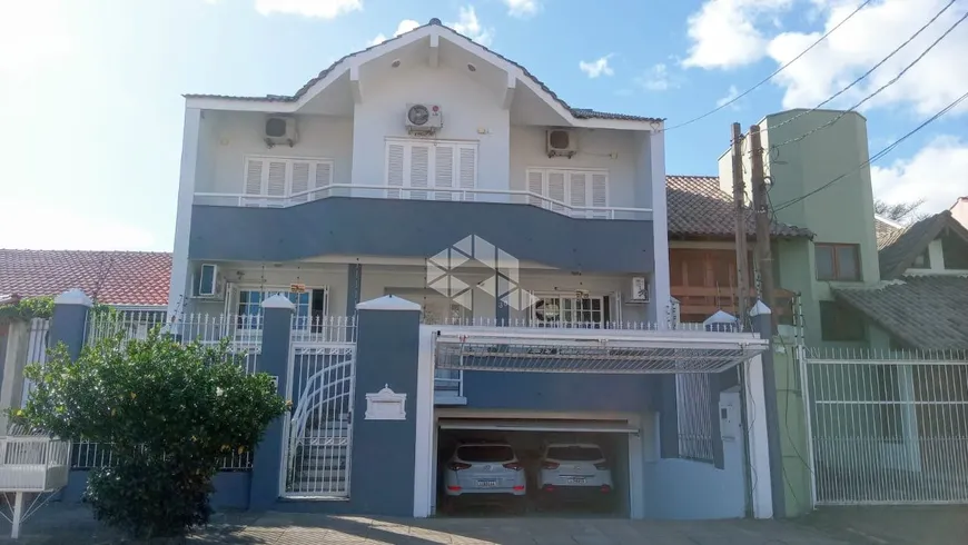 Foto 1 de Casa com 5 Quartos à venda, 397m² em Morro Santana, Porto Alegre