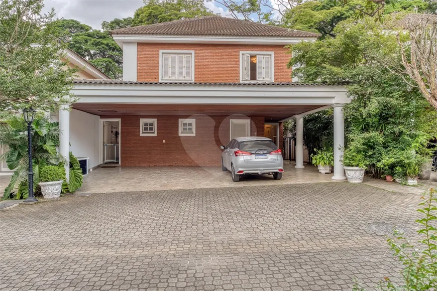 Foto 1 de Casa de Condomínio com 4 Quartos à venda, 441m² em Santo Amaro, São Paulo