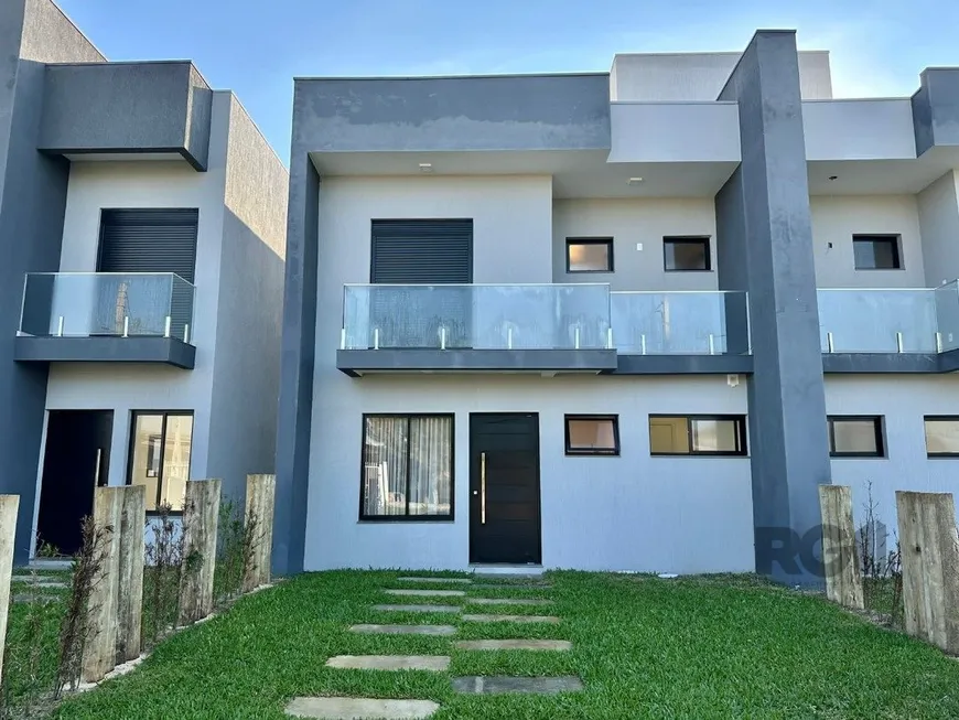 Foto 1 de Sobrado com 3 Quartos à venda, 120m² em Arco Iris, Capão da Canoa