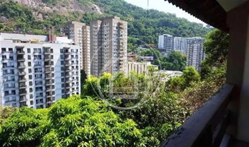 Foto 1 de Casa com 4 Quartos à venda, 350m² em Laranjeiras, Rio de Janeiro