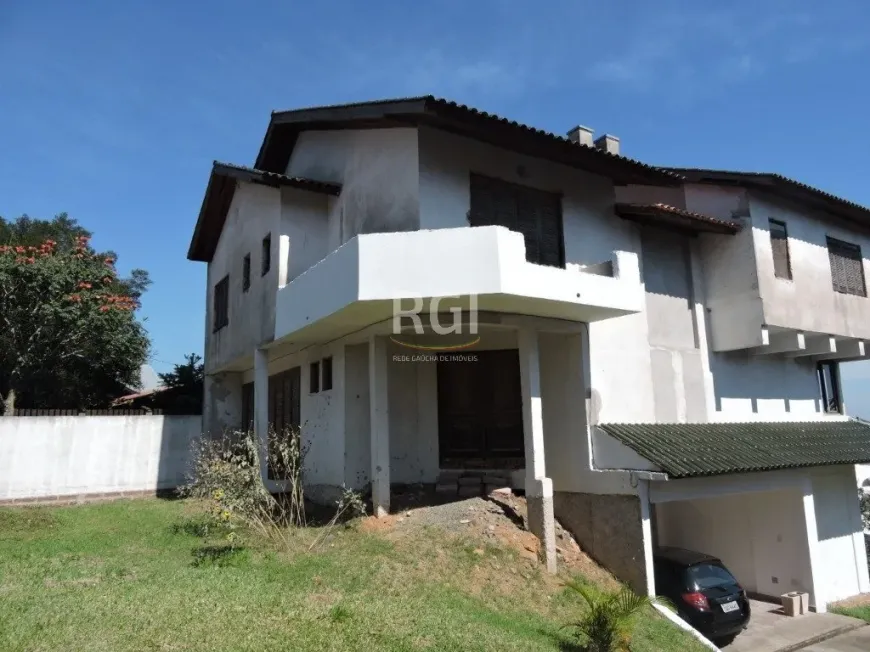 Foto 1 de Casa com 5 Quartos à venda, 300m² em Teresópolis, Porto Alegre