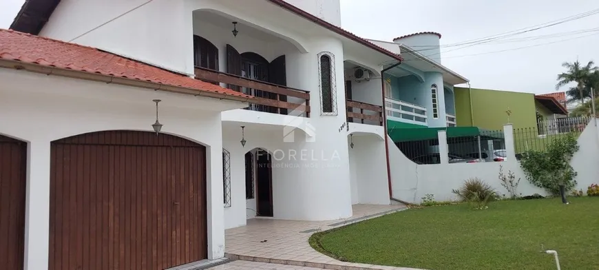 Foto 1 de Casa com 4 Quartos à venda, 279m² em Barreiros, São José