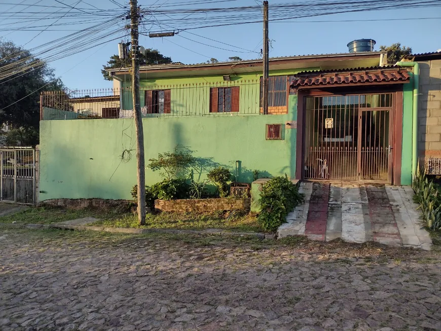 Foto 1 de Casa com 4 Quartos à venda, 239m² em Krahe, Viamão