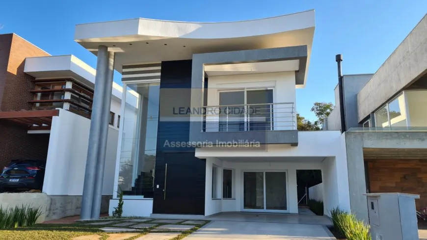 Foto 1 de Casa de Condomínio com 4 Quartos à venda, 284m² em Condominio Buena Vista, Viamão