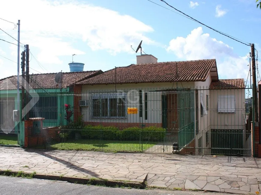 Foto 1 de Casa com 5 Quartos à venda, 245m² em Rubem Berta, Porto Alegre