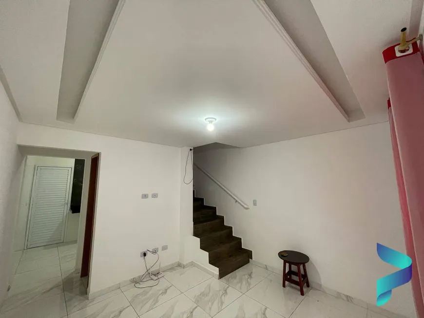 Foto 1 de Casa de Condomínio com 2 Quartos à venda, 58m² em Vila Tupi, Praia Grande