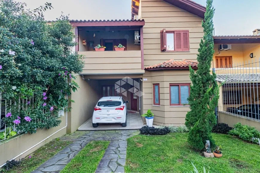 Foto 1 de Casa com 4 Quartos à venda, 226m² em Espiríto Santo, Porto Alegre