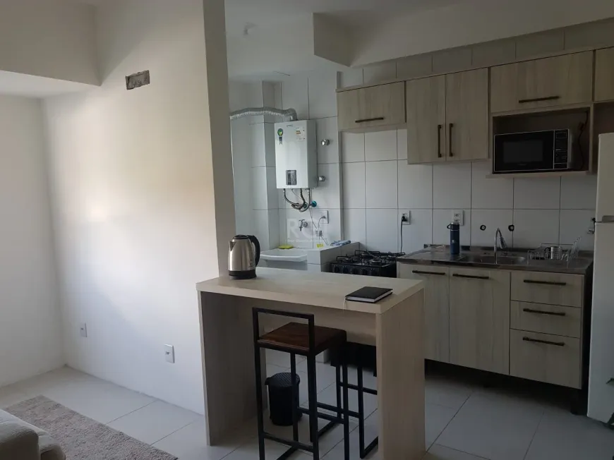 Foto 1 de Apartamento com 1 Quarto à venda, 30m² em Santo Antônio, Porto Alegre