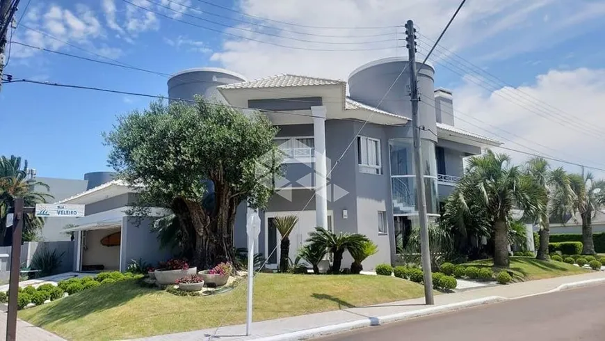 Foto 1 de Casa de Condomínio com 4 Quartos à venda, 389m² em Velas da Marina, Capão da Canoa