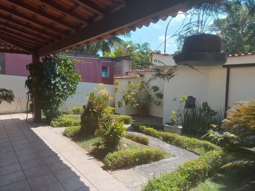 Foto 1 de Casa de Condomínio com 4 Quartos à venda, 421m² em Barra da Tijuca, Rio de Janeiro