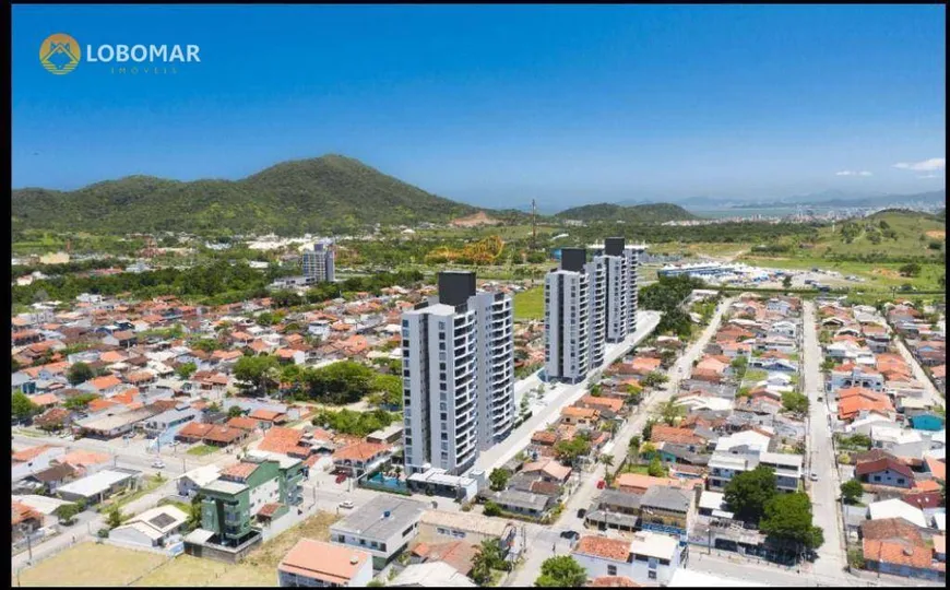 Foto 1 de Apartamento com 3 Quartos à venda, 76m² em Praia de Armacao, Penha