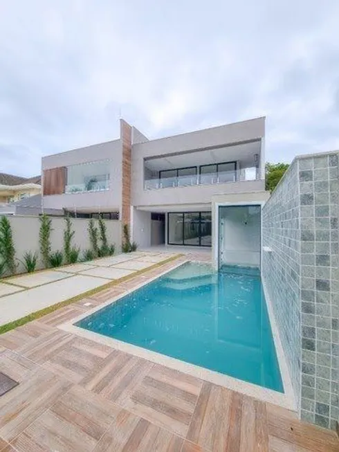 Foto 1 de Casa com 4 Quartos à venda, 420m² em Barra da Tijuca, Rio de Janeiro