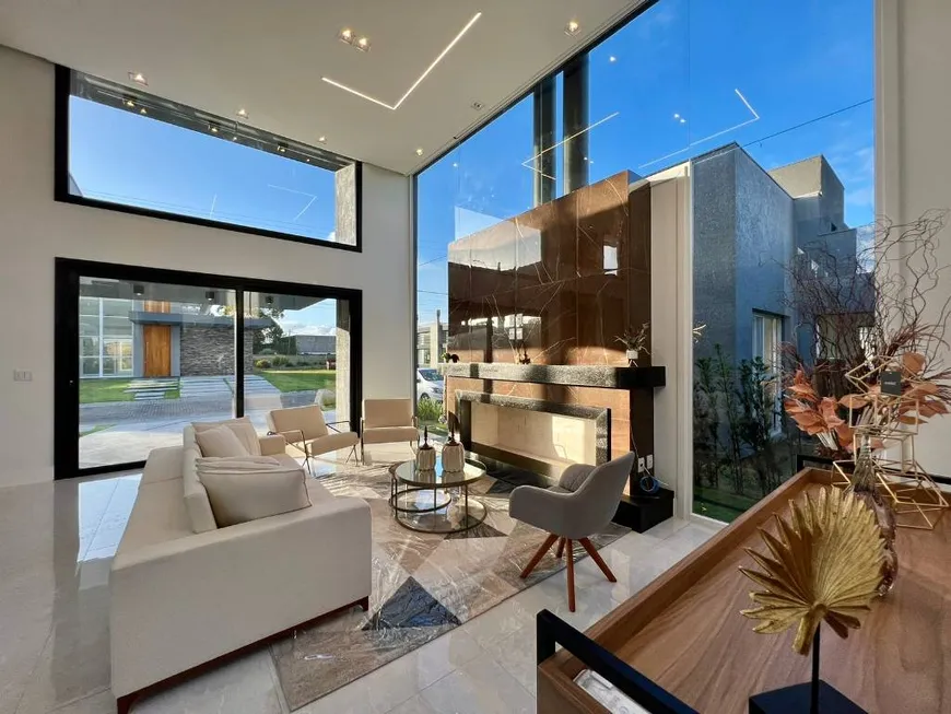 Foto 1 de Casa de Condomínio com 4 Quartos à venda, 180m² em Condominio Dubai Resort, Capão da Canoa