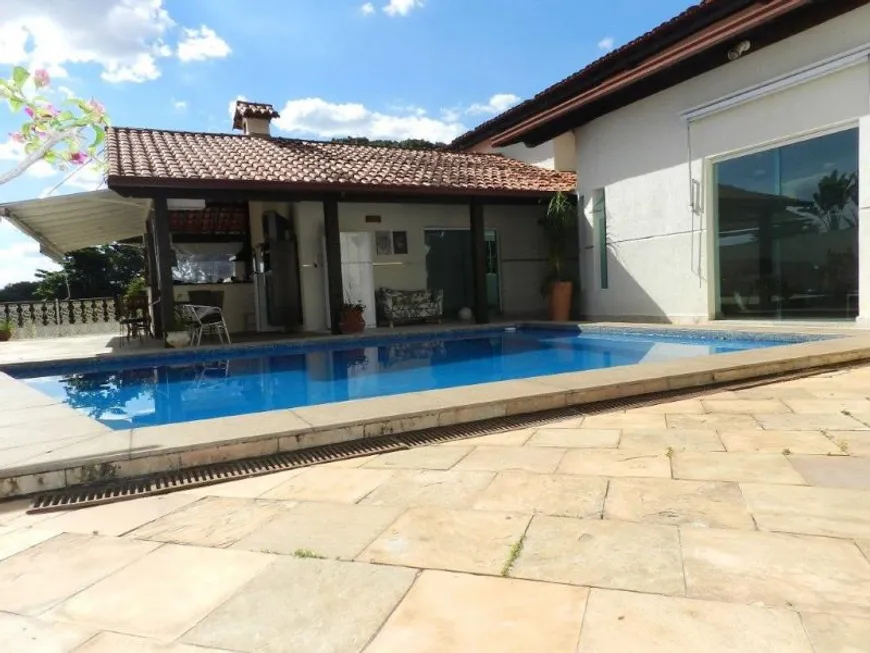 Foto 1 de Casa com 7 Quartos para venda ou aluguel, 1100m² em Bandeirantes, Belo Horizonte