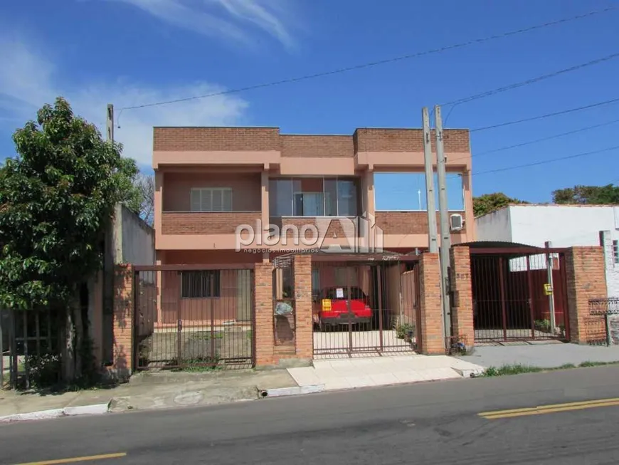 Foto 1 de Casa com 2 Quartos à venda, 124m² em Centro, Gravataí