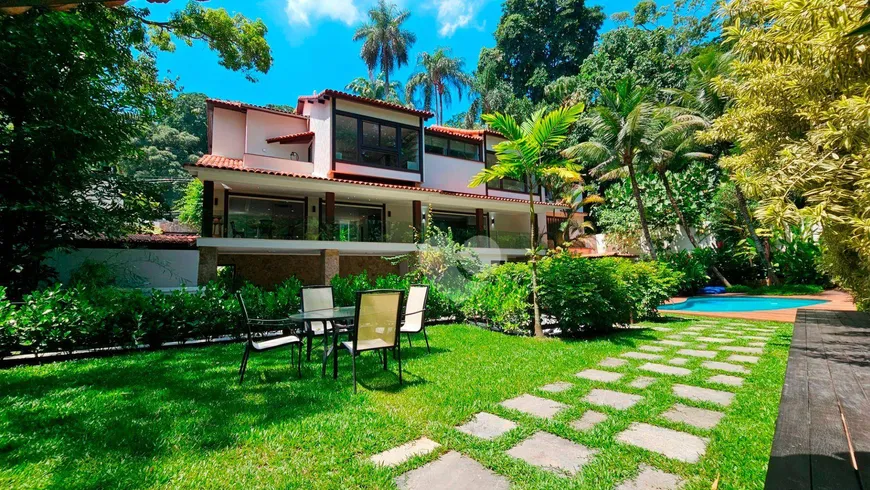 Foto 1 de Casa de Condomínio com 5 Quartos para venda ou aluguel, 780m² em Itanhangá, Rio de Janeiro