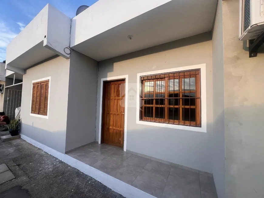 Foto 1 de Casa com 2 Quartos à venda, 59m² em Tarumã, Viamão