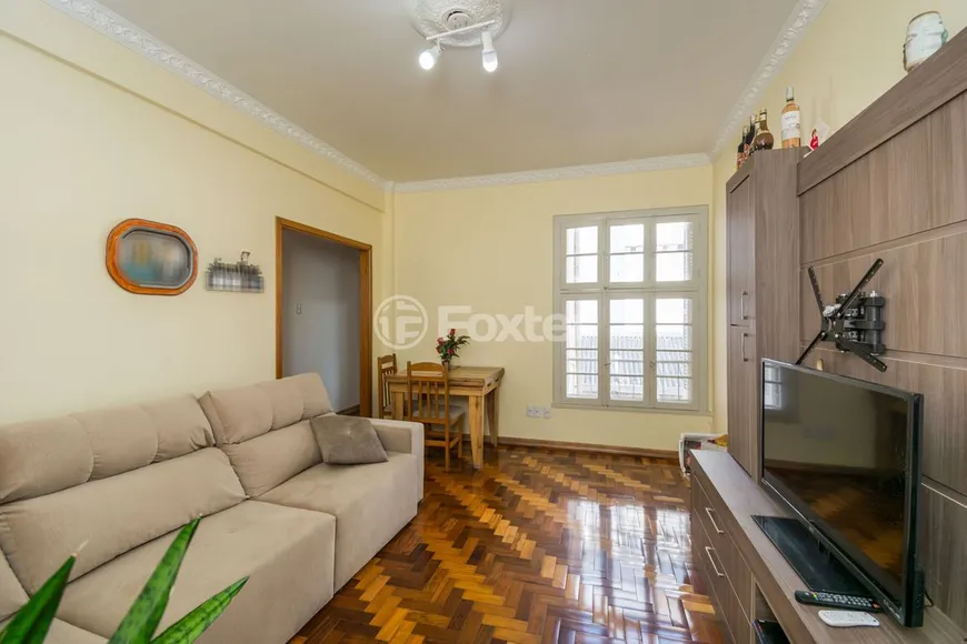 Foto 1 de Apartamento com 4 Quartos à venda, 84m² em Independência, Porto Alegre