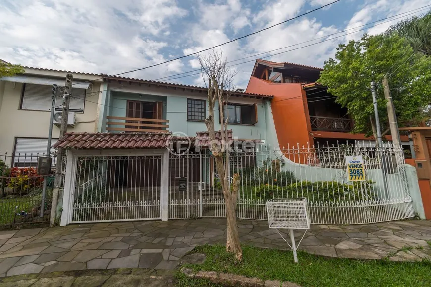 Foto 1 de Casa com 4 Quartos à venda, 242m² em Ipanema, Porto Alegre