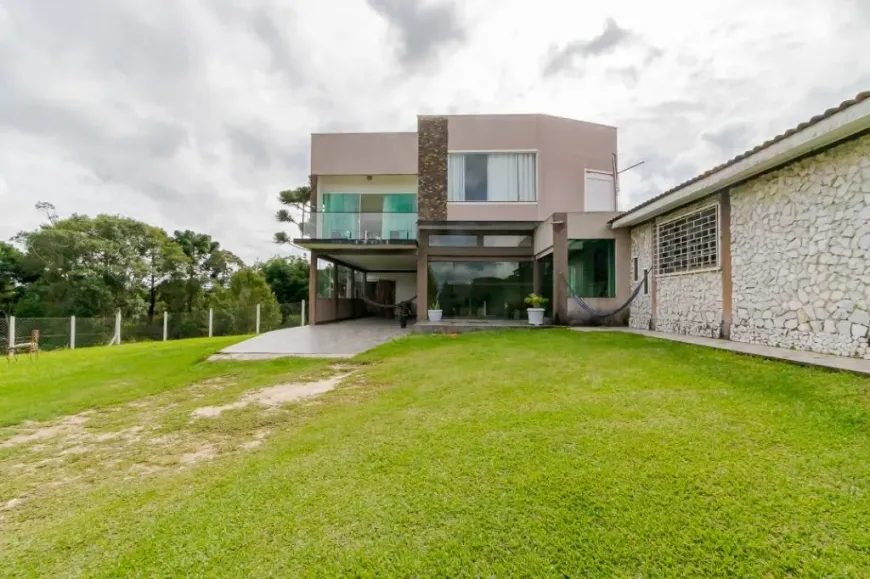 Foto 1 de Casa com 7 Quartos à venda, 350m² em Riviera, Curitiba