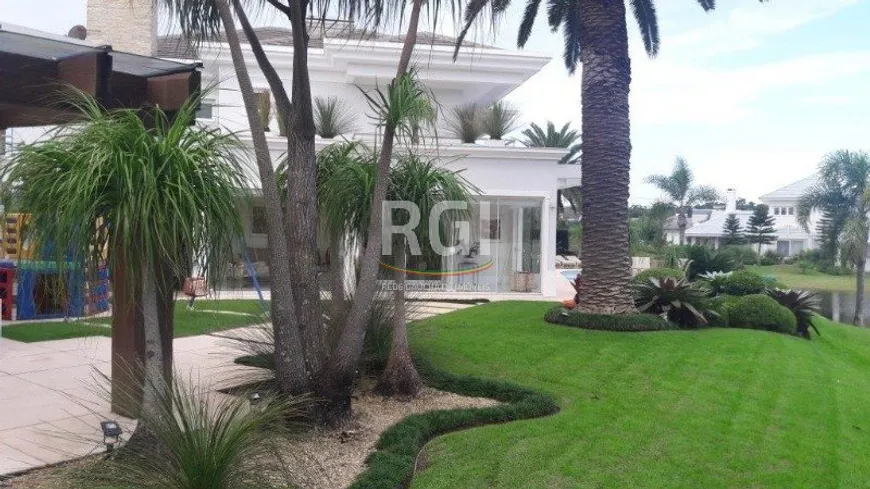 Foto 1 de Casa com 6 Quartos à venda, 727m² em Centro, Atlântida
