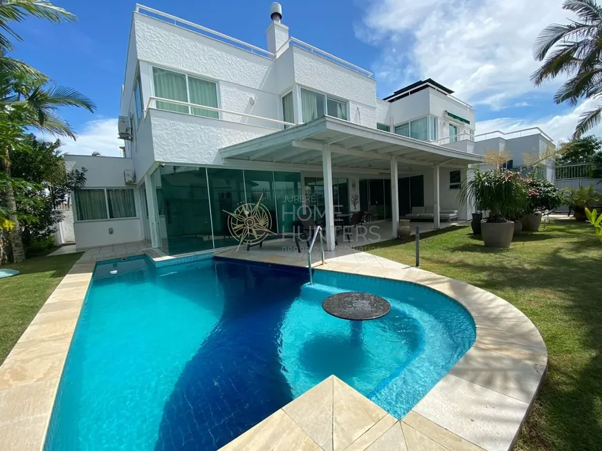 Foto 1 de Casa com 4 Quartos para venda ou aluguel, 700m² em Jurerê Internacional, Florianópolis