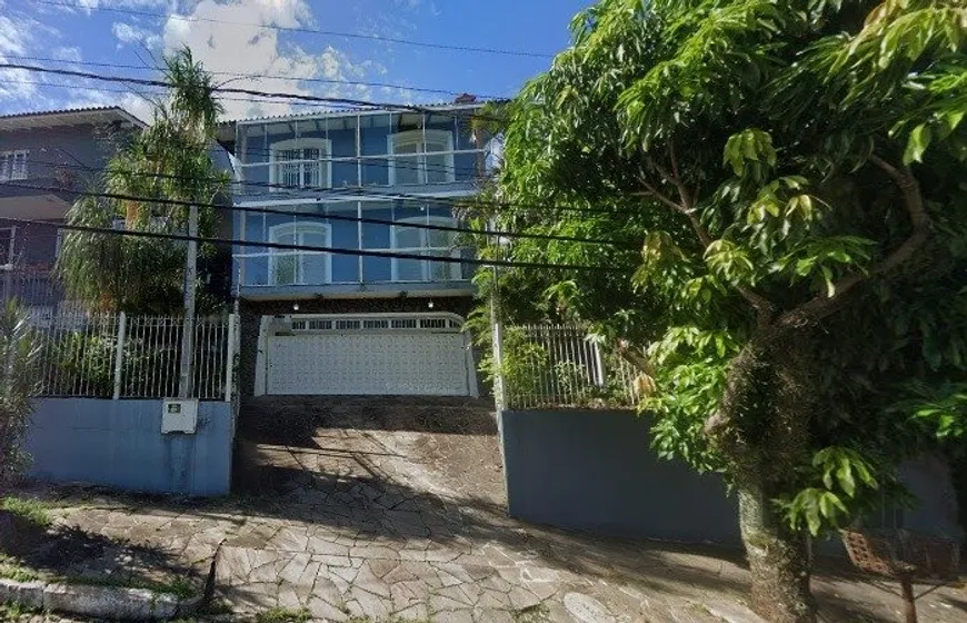 Foto 1 de Casa com 4 Quartos à venda, 417m² em Teresópolis, Porto Alegre