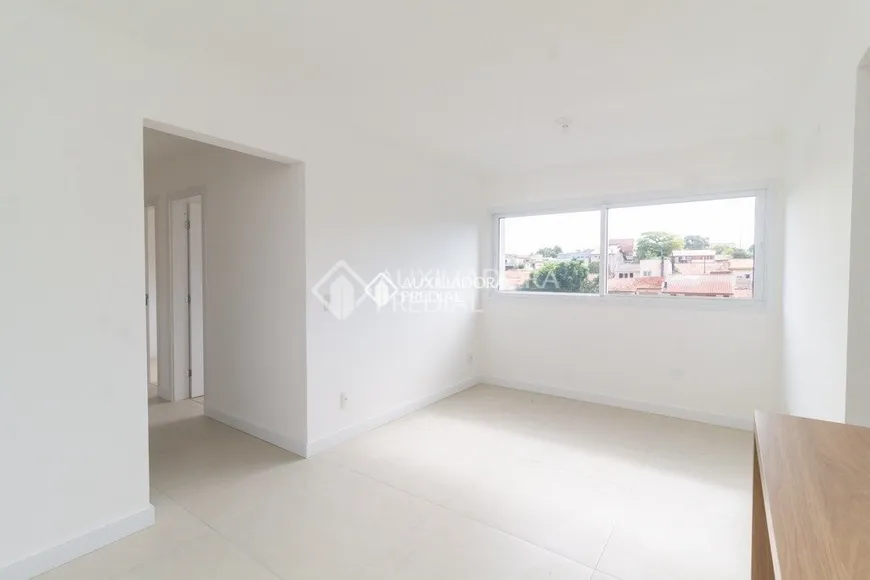 Foto 1 de Apartamento com 3 Quartos à venda, 68m² em Santo Antônio, Porto Alegre