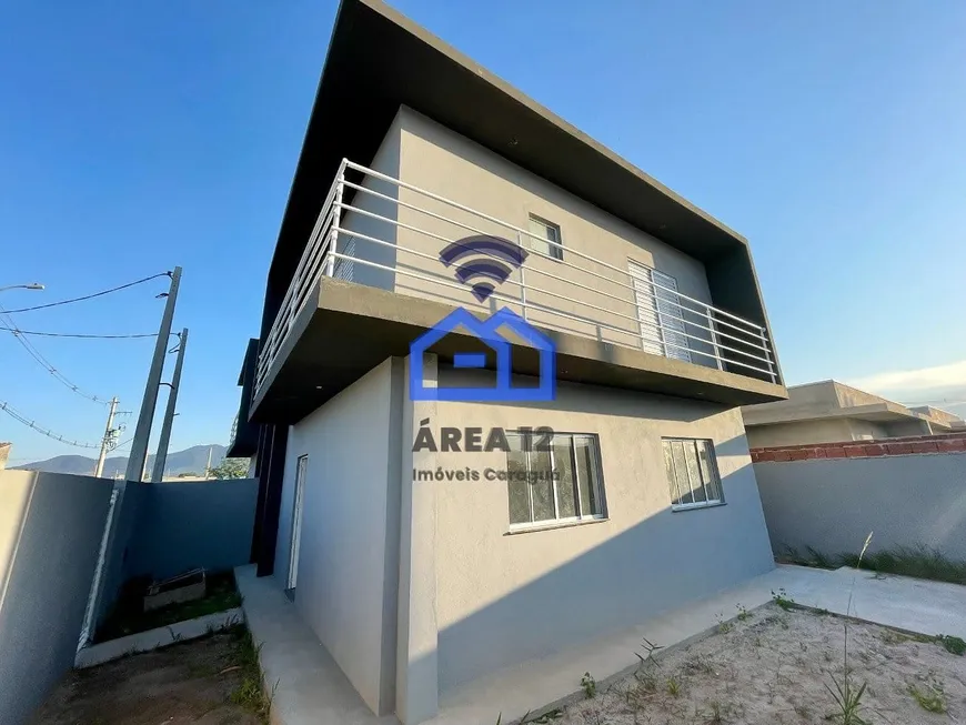 Foto 1 de Casa com 3 Quartos à venda, 102m² em Balneário dos Golfinhos , Caraguatatuba