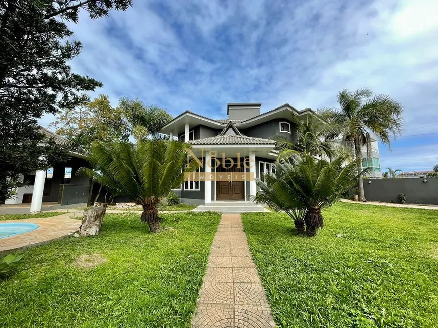 Foto 1 de Casa com 4 Quartos à venda, 180m² em Praia da Cal, Torres