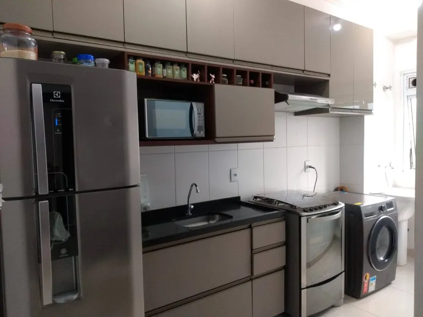 Foto 1 de Apartamento com 2 Quartos à venda, 52m² em Jardim do Lago, São Paulo