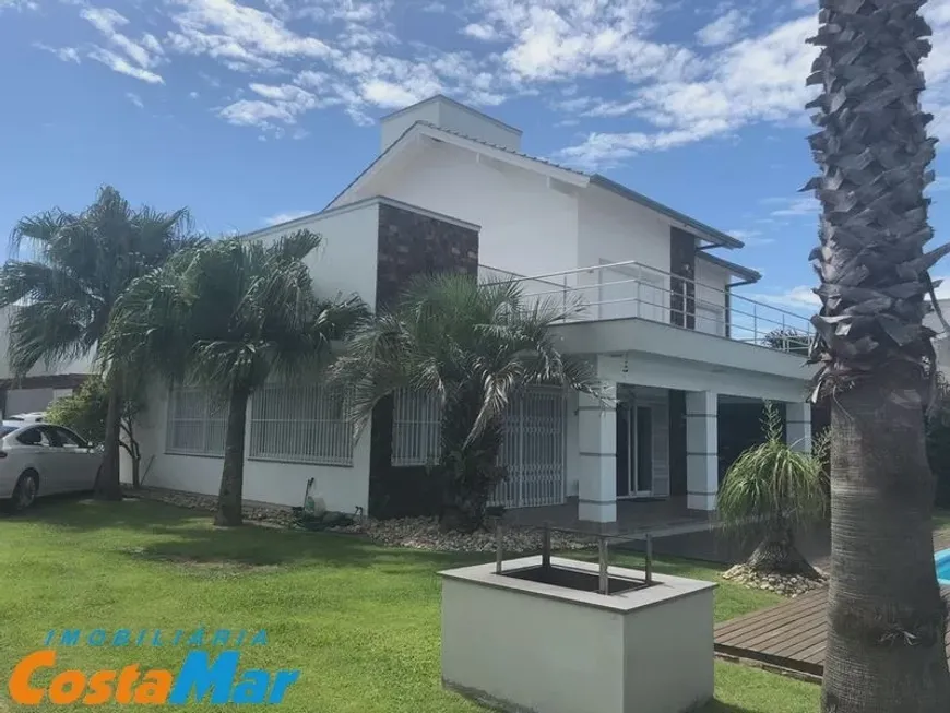 Foto 1 de Casa com 6 Quartos à venda, 370m² em Zona Nova, Tramandaí