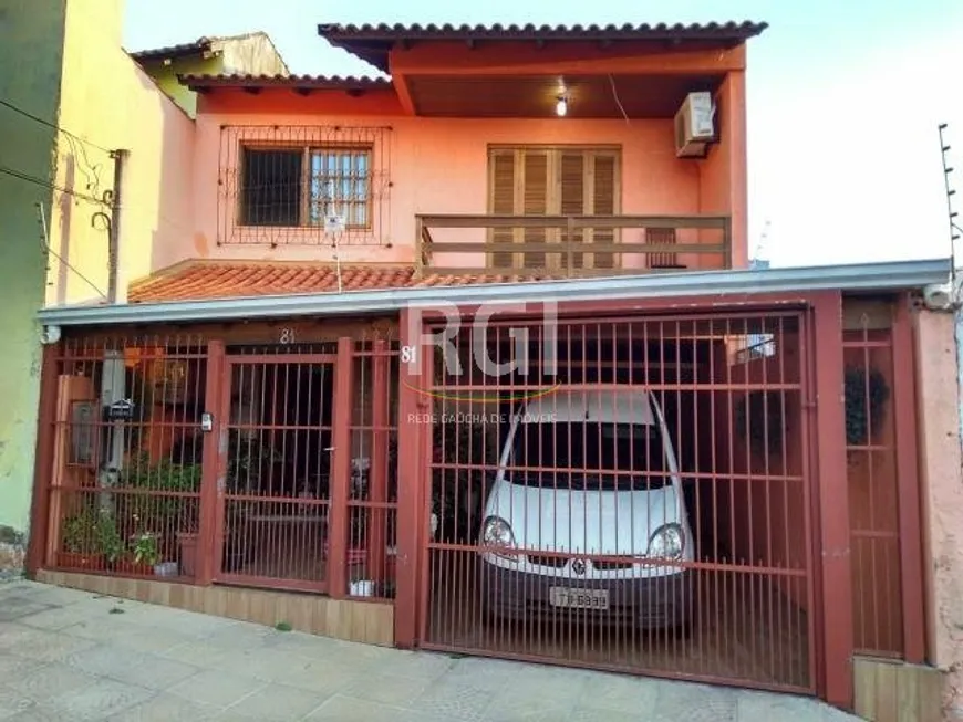 Foto 1 de Casa com 5 Quartos à venda, 219m² em Azenha, Porto Alegre