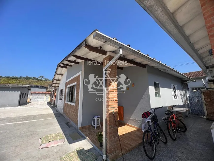 Foto 1 de Casa de Condomínio com 2 Quartos à venda, 67m² em Balneário Califórnia, Caraguatatuba