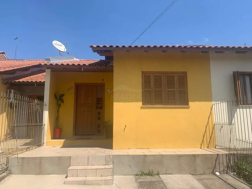 Foto 1 de Casa com 2 Quartos à venda, 56m² em Tarumã, Viamão