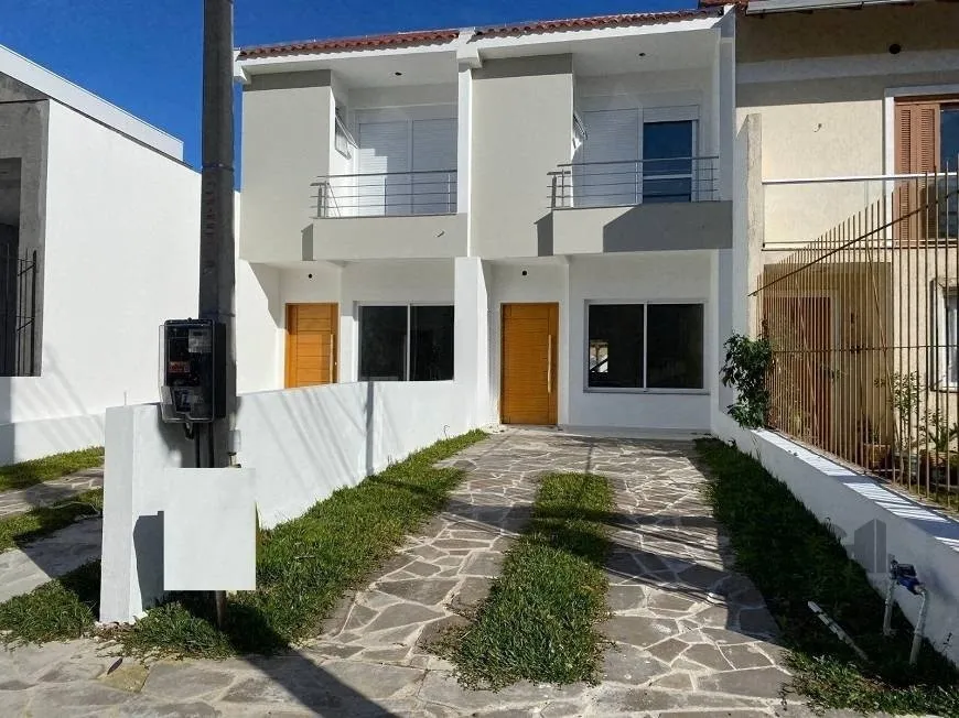 Foto 1 de Casa com 3 Quartos à venda, 126m² em Guarujá, Porto Alegre
