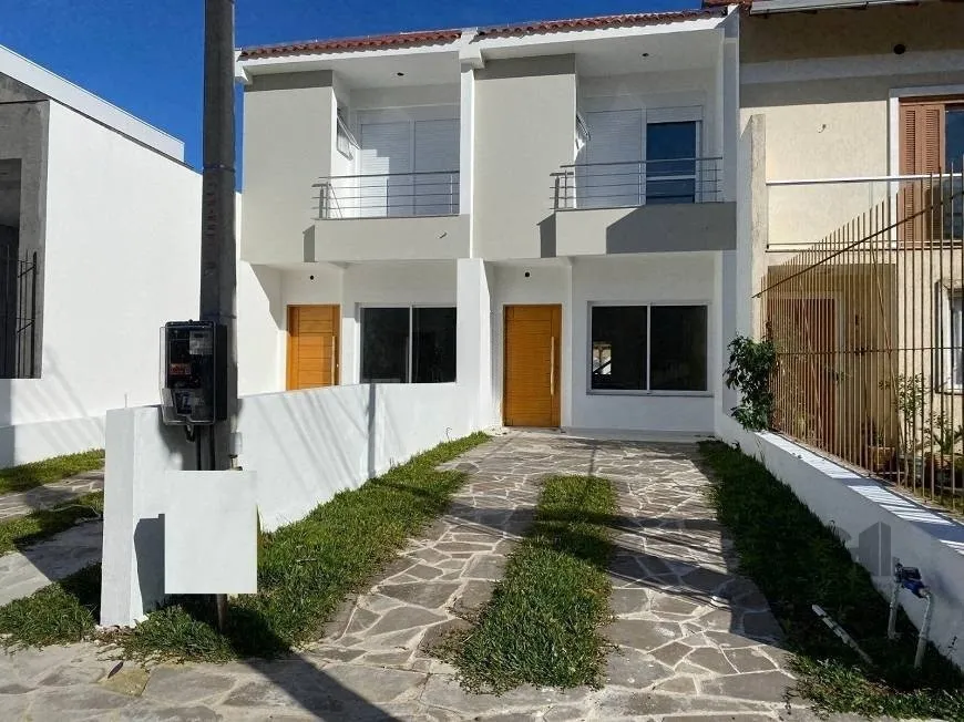 Foto 1 de Casa com 3 Quartos à venda, 128m² em Guarujá, Porto Alegre