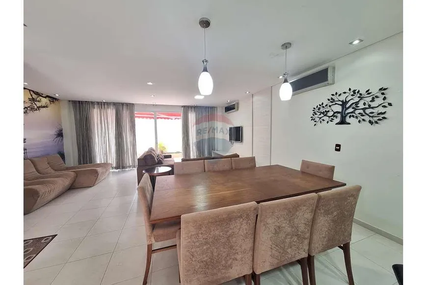 Foto 1 de Apartamento com 4 Quartos à venda, 219m² em Jardim Três Marias, Guarujá